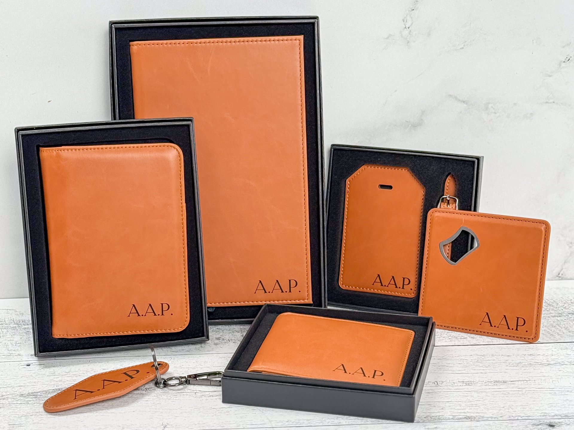 Gift-boxed set of rawhide MakerFlo Laserette products laser engraved with A.A.P. initials