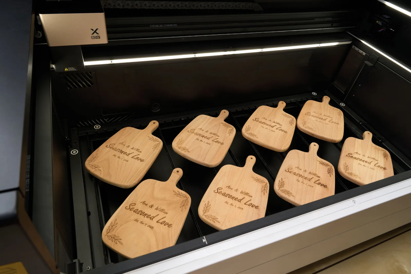 Engraved wood cutting boards inside the xTool P3 80W CO2 laser